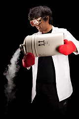 Image showing Scientist pouring liquid nitrogen