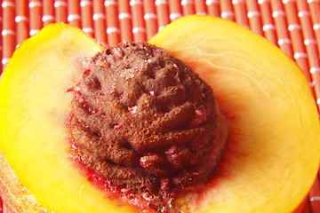 Image showing halved peach