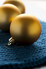 Image showing Gold baubles