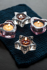 Image showing Candles on blue mat