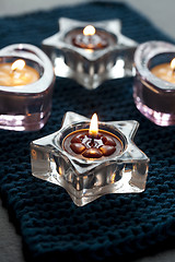 Image showing Candles on blue mat