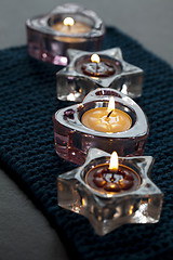 Image showing Candles on blue mat