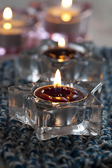 Image showing Candles on blue mat