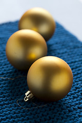 Image showing Gold baubles