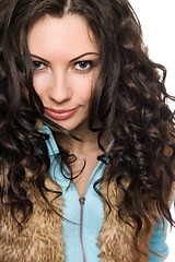 Image showing Closeup portrait of playful young brunette. Isolated