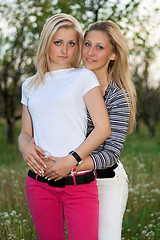 Image showing Portrait of two smiling lovely young women