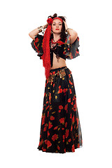 Image showing Gypsy woman in a black skirt. Isolated