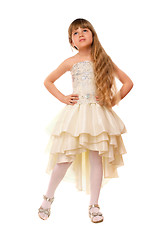 Image showing Lovely little girl in a beige dress