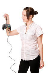 Image showing Charming brunette girl with a joystick