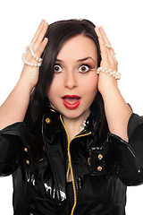 Image showing Shocked young woman in black jacket