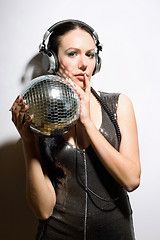 Image showing Portrait of nice brunette with a mirror ball