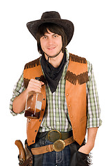 Image showing young cowboy with a bottle