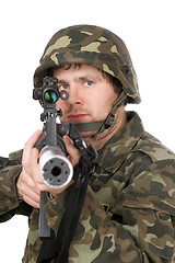 Image showing Armed soldier aiming m16