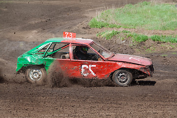 Image showing Race for survival. Green red car