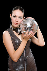 Image showing Portrait of beautiful young brunette with a mirror ball