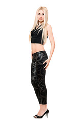 Image showing Attractive young blonde in black leggings