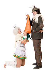 Image showing Funny young couple with carrot