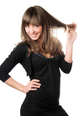 Image showing Cheerful brunette in black
