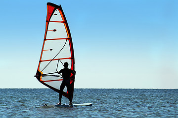 Image showing Silhouette of a windsurfer on the sea