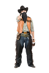 Image showing Cowboy with a gun and bottle