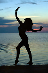 Image showing Silhouette of a young woman