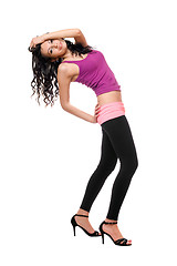 Image showing Joyful young brunette in a black leggings