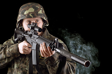 Image showing Soldier with the smoking gun