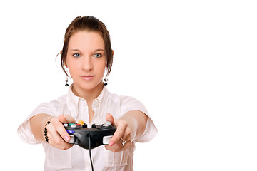 Image showing Young brunette girl with a joystick