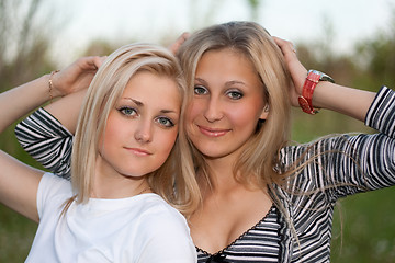 Image showing Closeup portrait of two attractive young women