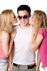 Image showing Two pretty blonde kissing young man