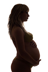 Image showing Silhouette of a pregnant young woman