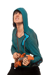 Image showing Expressive man with a little guitar