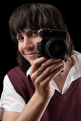 Image showing Smiling photographer with the vintage camera