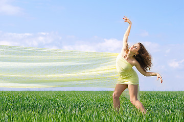 Image showing Expressive flexible young woman