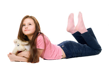 Image showing Little girl with a teddy elephant