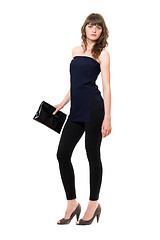 Image showing Charming girl in a black leggings. Isolated