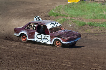 Image showing Race for survival. White purple car