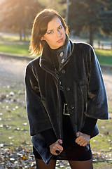 Image showing lovely young woman in autumn park