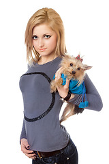 Image showing Pretty blonde posing with puppy. Isolated