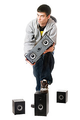 Image showing Young man with a speakers. Isolated