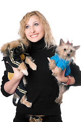 Image showing Portrait of smiling pretty blonde with two dogs