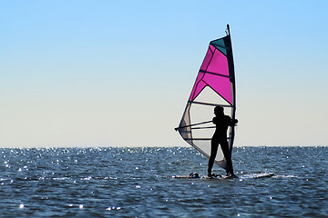 Image showing Silhouette of a girl windsurfer