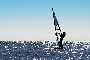 Image showing Silhouette of a girl windsurfer