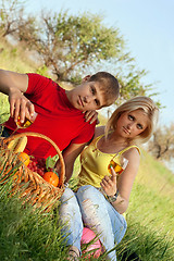 Image showing Attractive blonde and young man with wineglasses