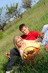 Image showing Beautiful blonde and young man with wineglasses