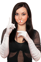 Image showing Young pretty brunette gesturing. Isolated