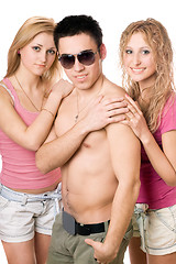 Image showing Two attractive blonde women with young man