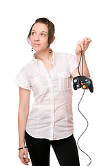 Image showing Beautiful brunette girl with a joystick