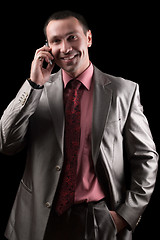 Image showing Portrait of a happy businessman. Isolated