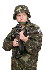 Image showing Armed soldier pointing m16. Upperhalf